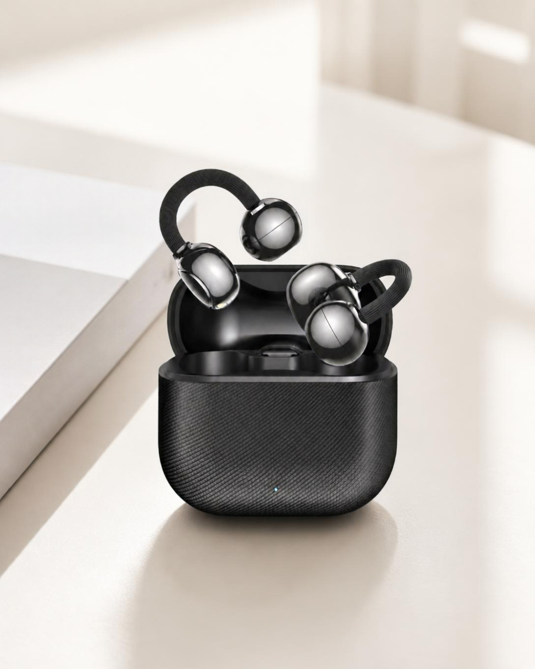 Sondly Clip Open-Ear Earbuds on a desk